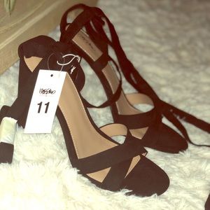 Black tie at ankle heels